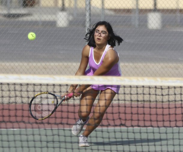 Annallisa Andrada mounted a ferocious comeback bid to win her singles match to help the Tigers beat Sunnyside Wednesday afternoon in Lemoore.